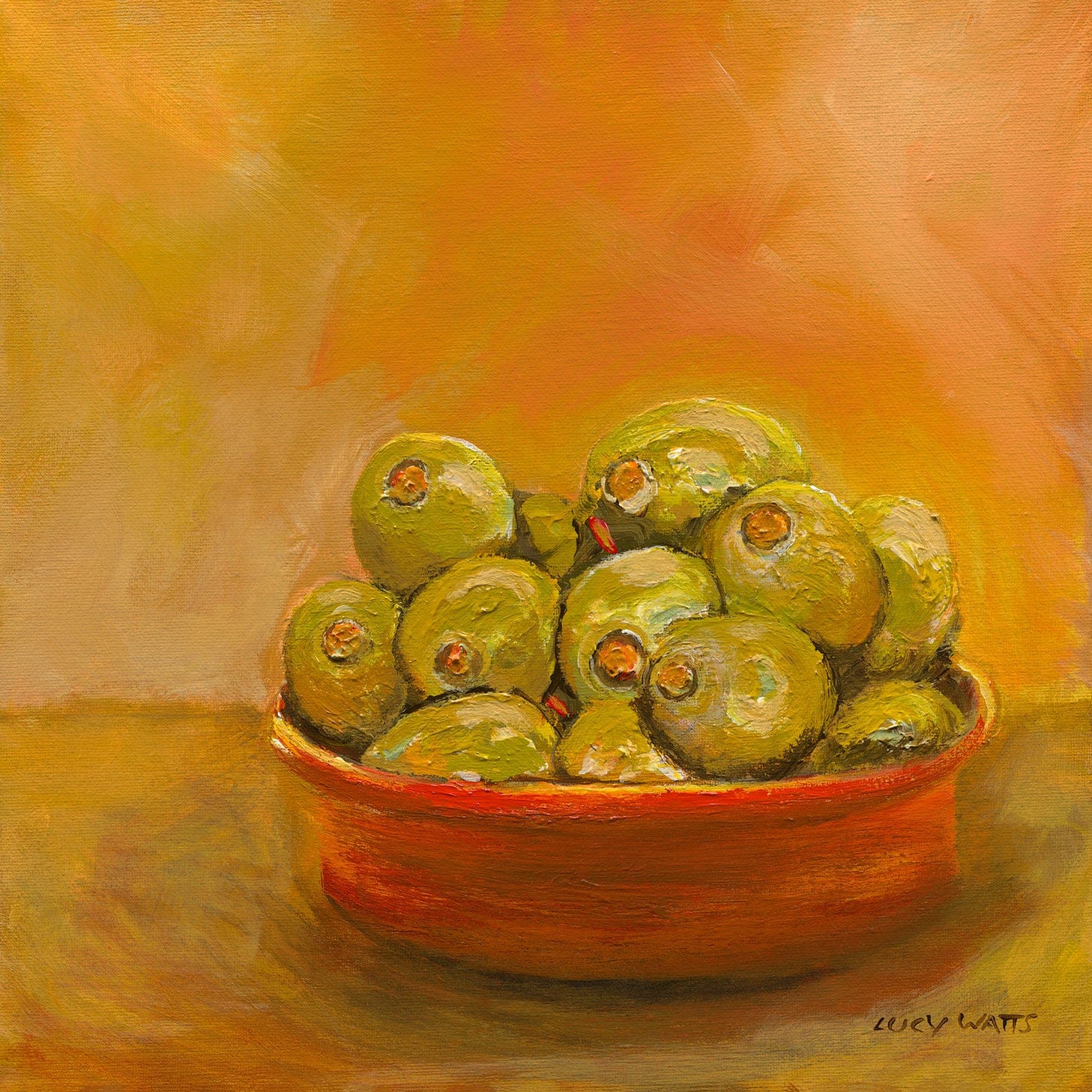 Framed painting of a bowl of green apples on an orange background