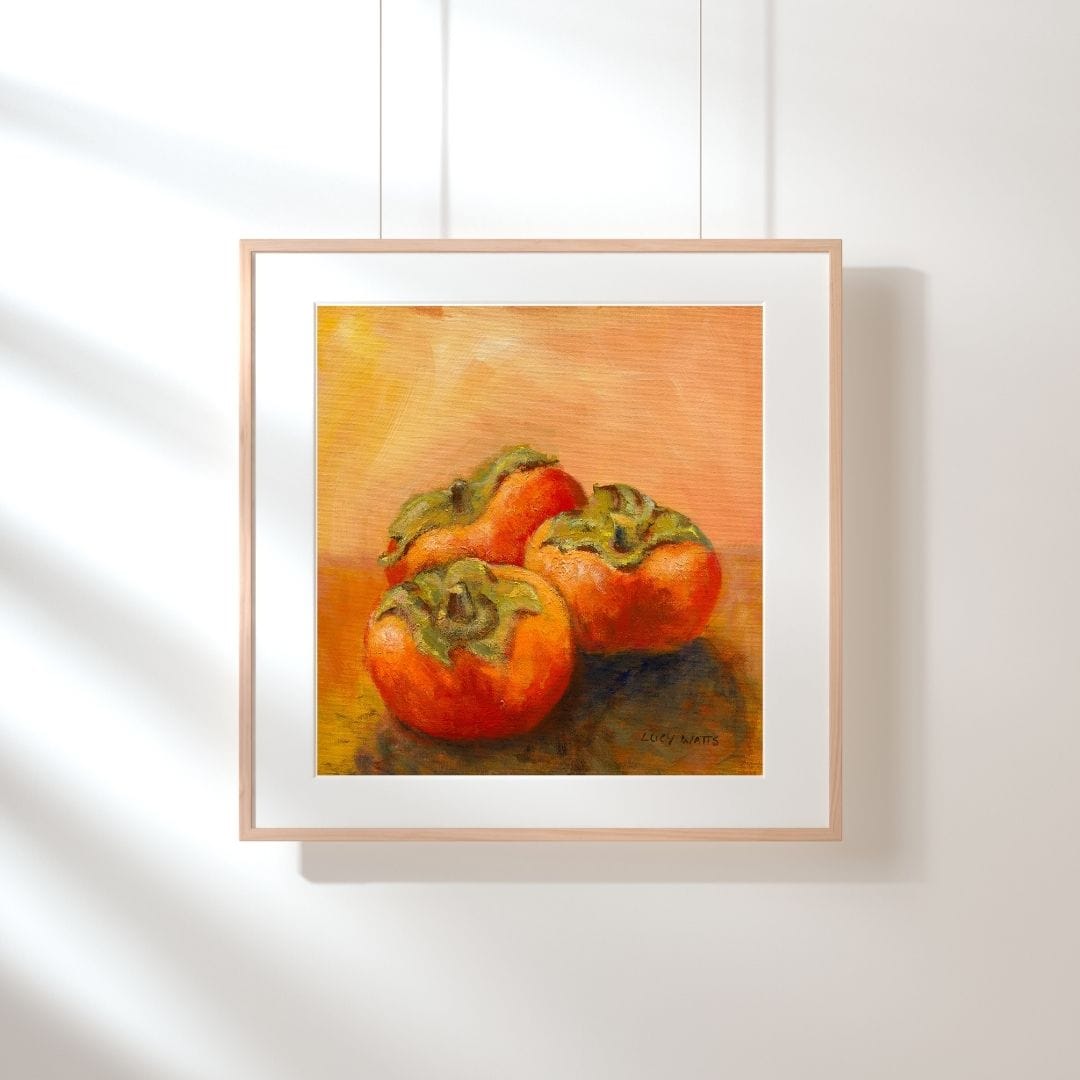 Lucy Watts Artwork Framed artwork of warm tone still life of  persimmons on a white wall