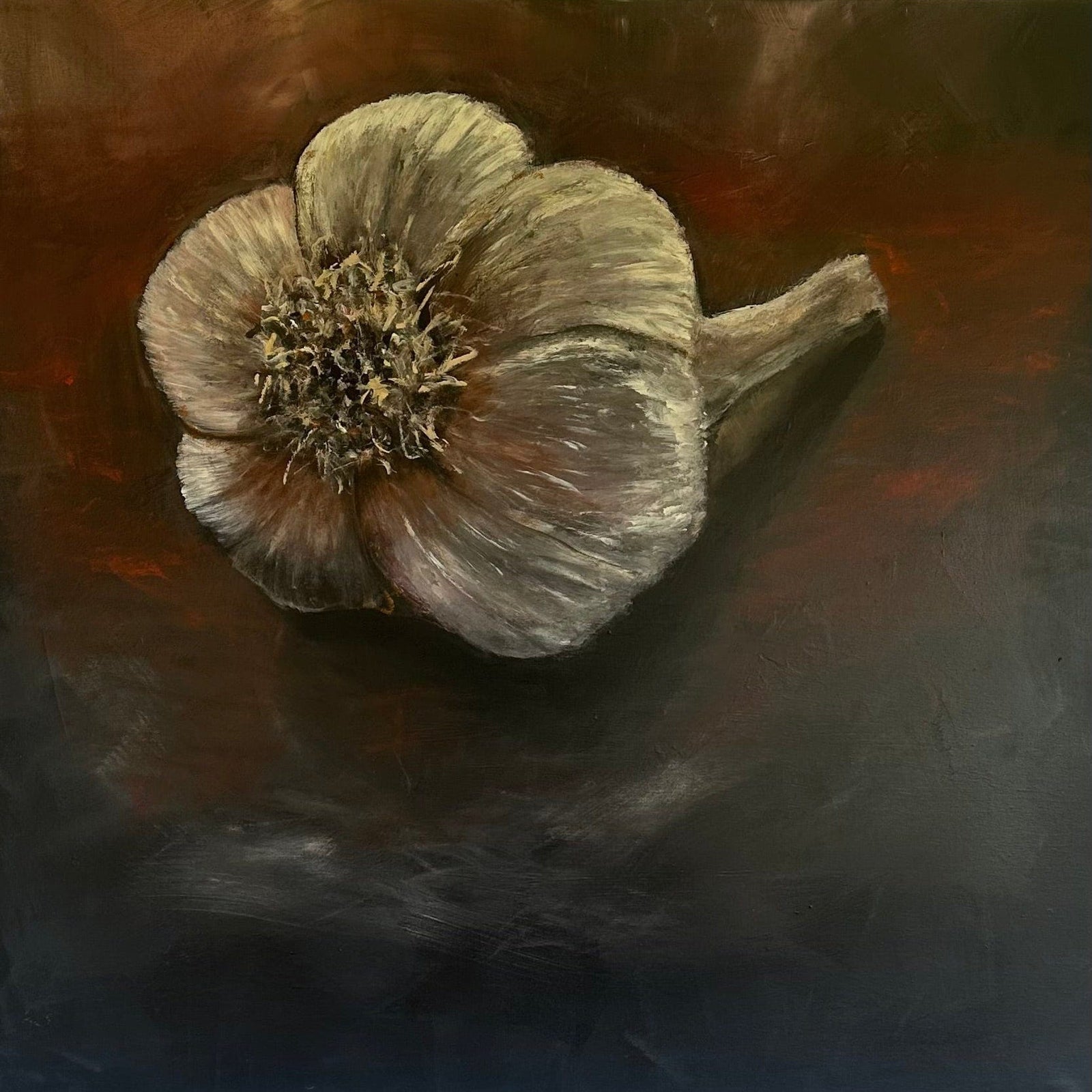 Framed artwork of a dried flower on a white wall