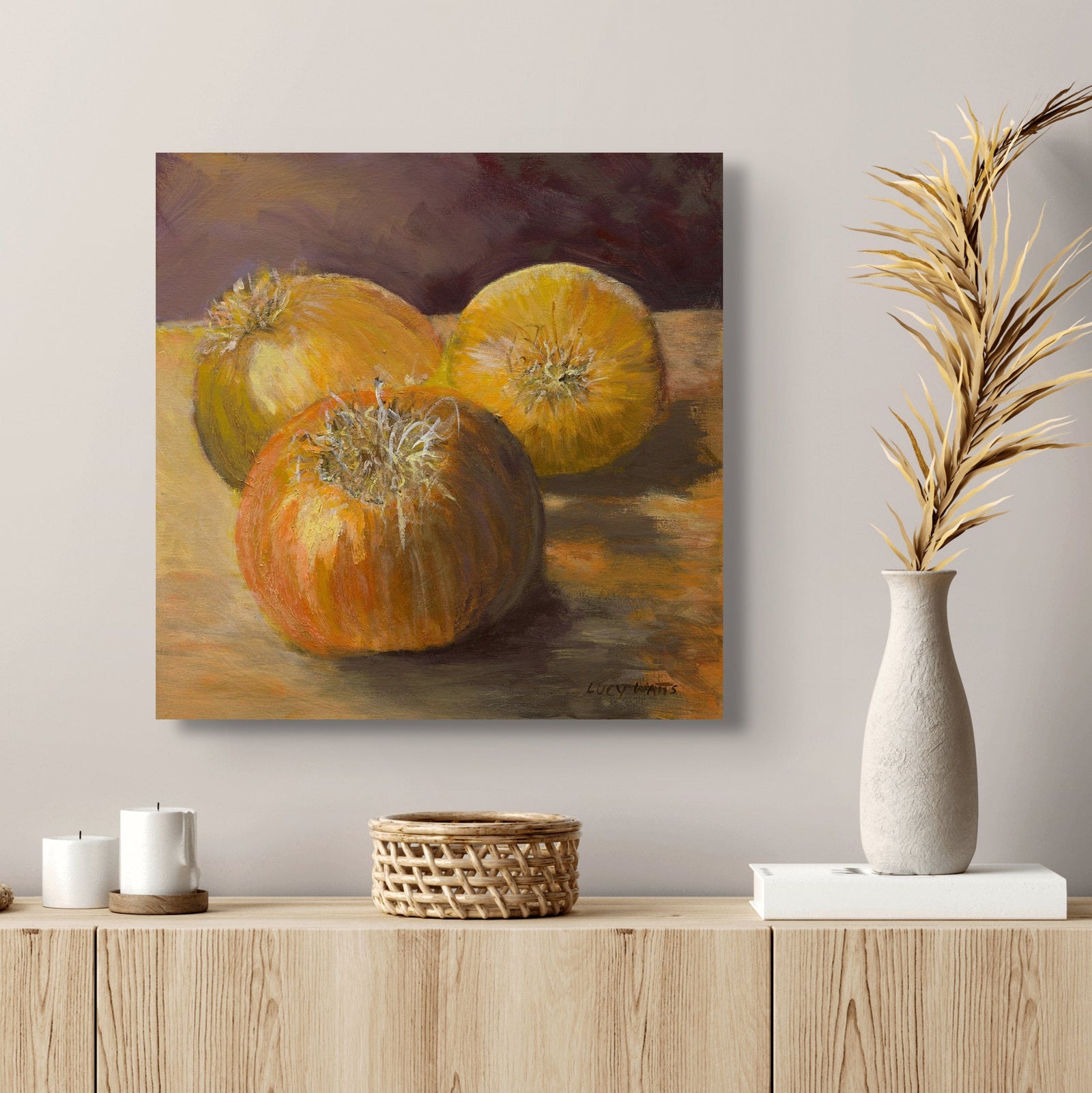 Oil painting of three pumpkins on a wooden surface with a dark background