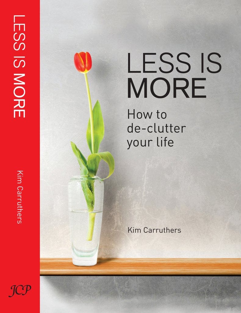 This image features a minimalist book cover for &quot;Less is More: How to De-Clutter Your Life&quot; by Kim Carruthers. The cover design is clean and straightforward, using a monochromatic color palette with hints of red and grey.