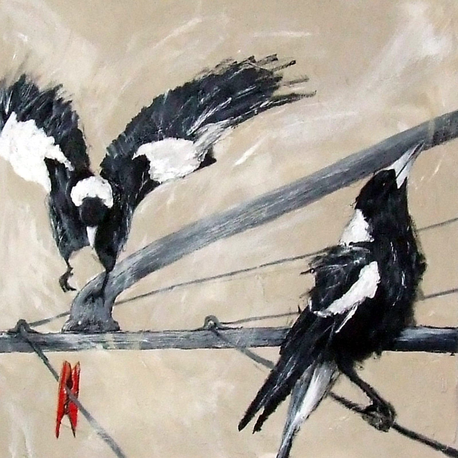 Two black and white birds perched on a wire against a beige background