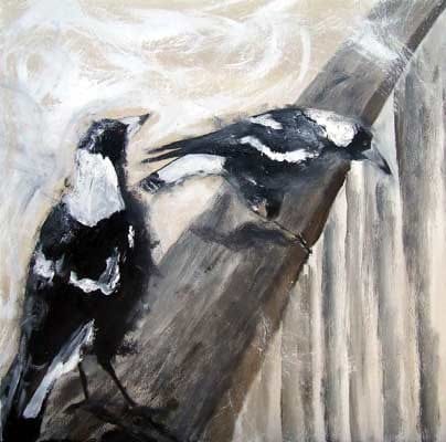 Two black and white birds perched on a branch against a textured beige background