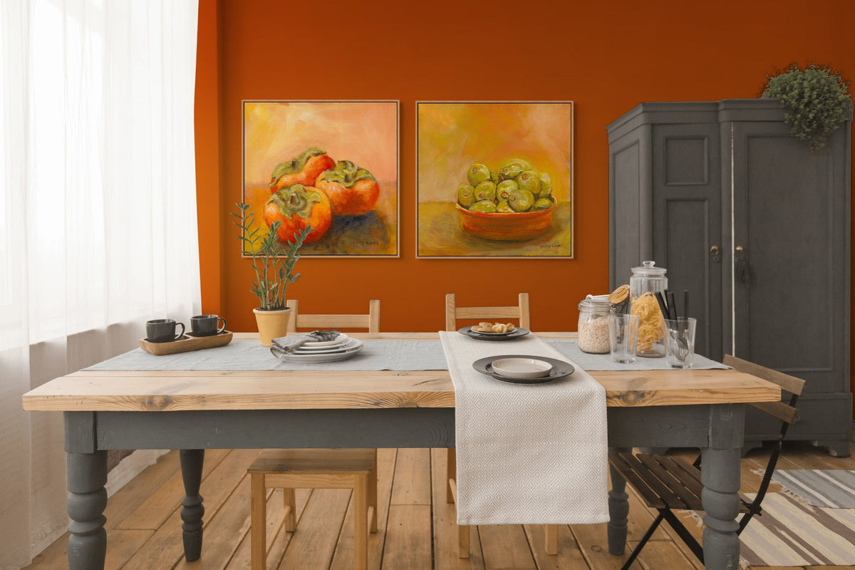 Dining room with a wooden table, chairs, and wall art depicting fruits and vegetables.