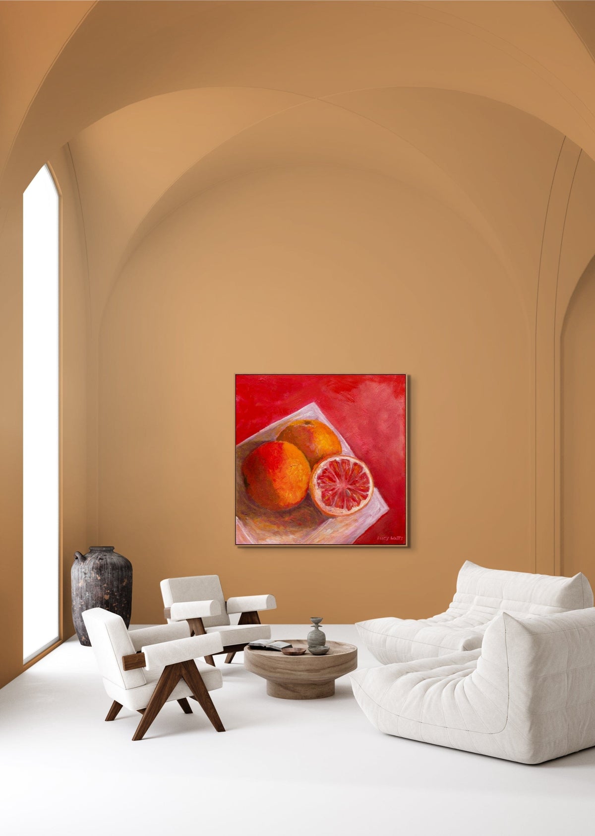 Modern living room with a Lucy Watts painting of ruby grapefruit fruits on warm tone  background